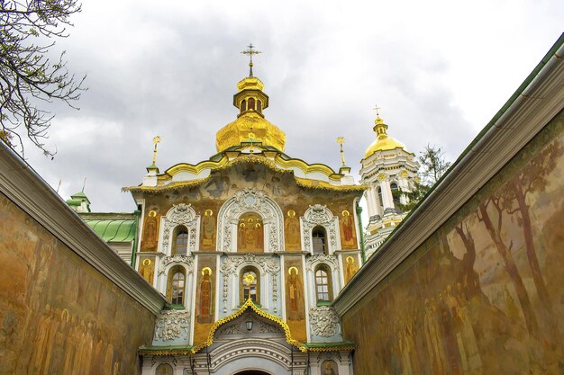 Entrance gate of historic Pechersk Lavra Monastery church temple Eastern Orthodox Christian complex of Caves with golden domes in KievUkraineOld religion national architecture herritage