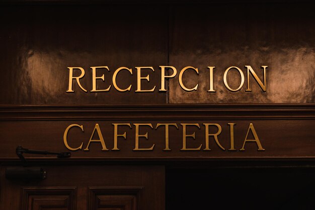 Entrance sign to the reception and cafeteria