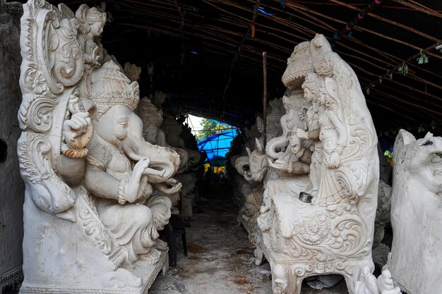 the entrance to the temple is covered in statues.