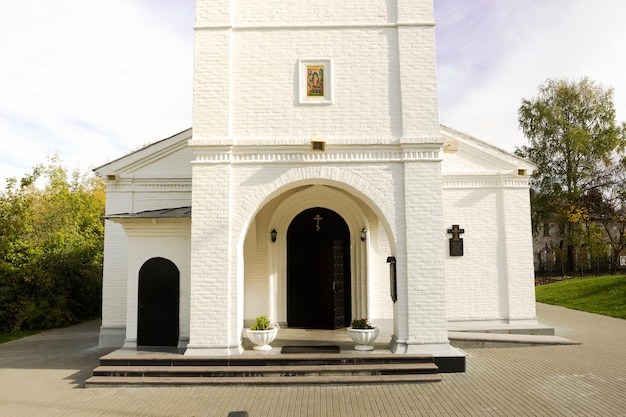 The entrance to the white Orthodox church