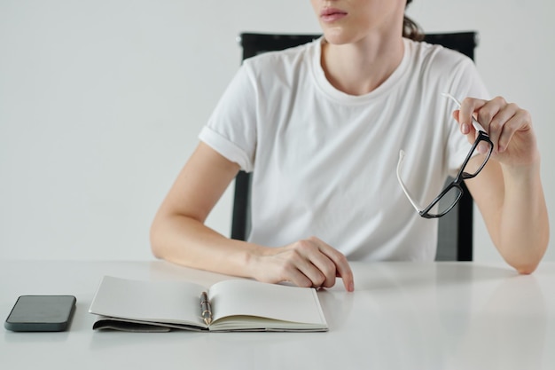 Entrepreneur Taking off Glasses