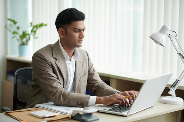 Entrepreneur Working at Office Desk