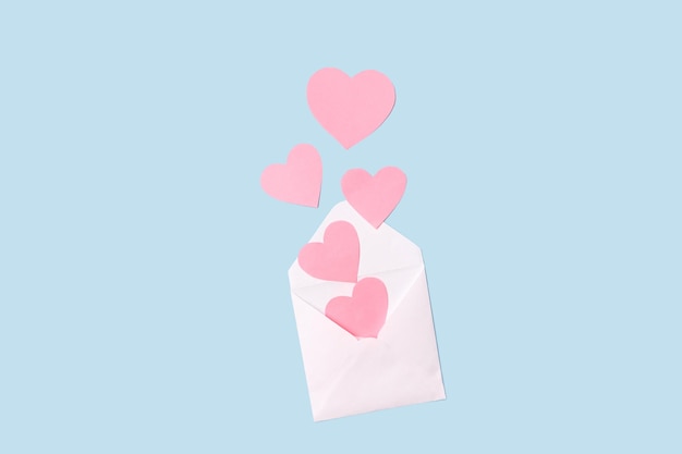 Envelope with valentines on a blue background