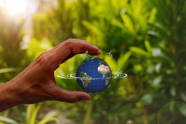 Photo environment concept green earth planet in hands with shining light save and protection earth sustainable and corporation development green eco friendly