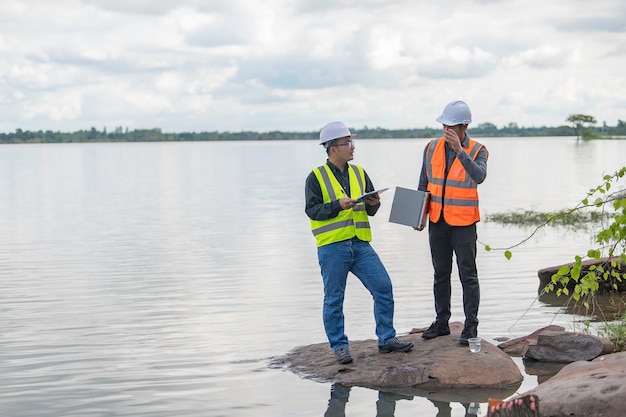 Environmental engineers inspect water qualityBring water to the lab for testingCheck the mineral content in water and soilConsultation to solve the problem of chemical contaminated water sources