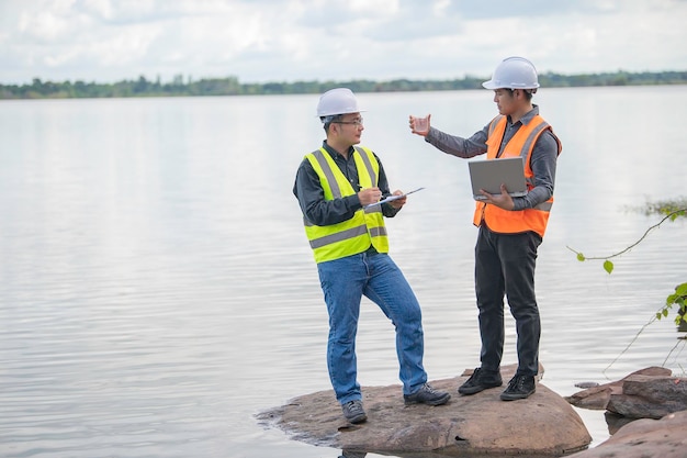 Environmental engineers inspect water qualityBring water to the lab for testingCheck the mineral content in water and soilConsultation to solve the problem of chemical contaminated water sources