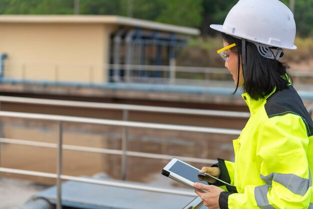 Environmental engineers work at wastewater treatment\
plantswater supply engineering working at water recycling plant for\
reuse