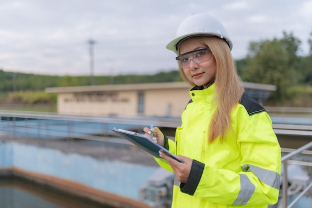 Environmental engineers work at wastewater treatment plantsWater supply engineering working at Water recycling plant for reuse