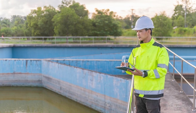 Environmental engineers work at wastewater treatment plantsWater supply engineering working at Water recycling plant for reuse