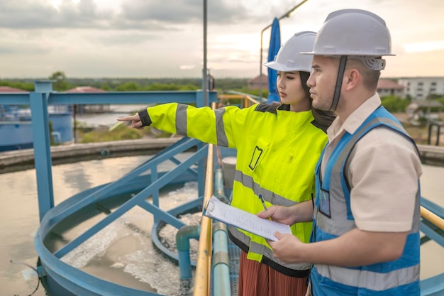 Environmental engineers work at wastewater treatment plantsWater supply engineering working at Water recycling plant for reuse