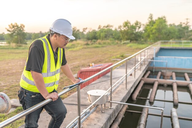 Environmental engineers work at wastewater treatment plantsWater supply engineering working at Water