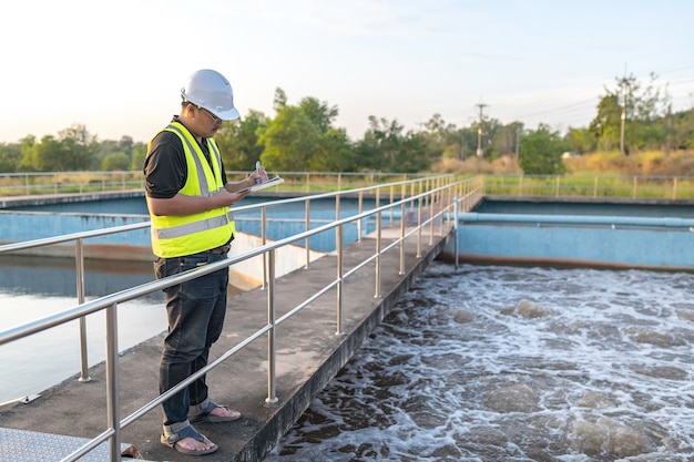 Environmental engineers work at wastewater treatment plantsWater supply engineering working at Water