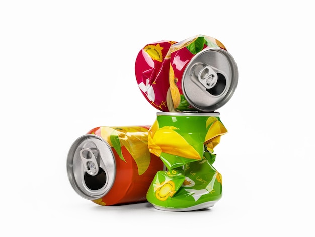 Environmental protection Crumpled bright aluminum soda cans closeup The concept of recycling