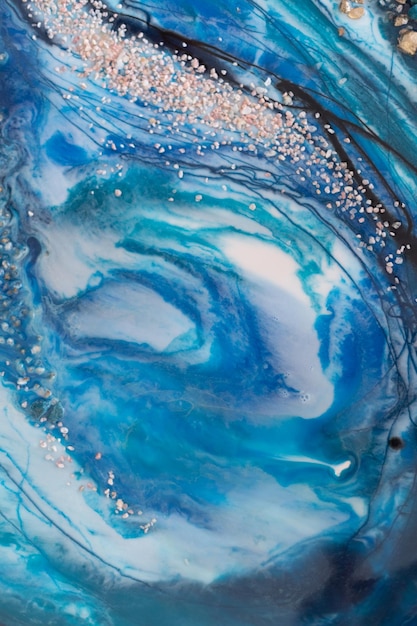 Epoxy resin art texture of blue and white paint fluid art kintsugi close up