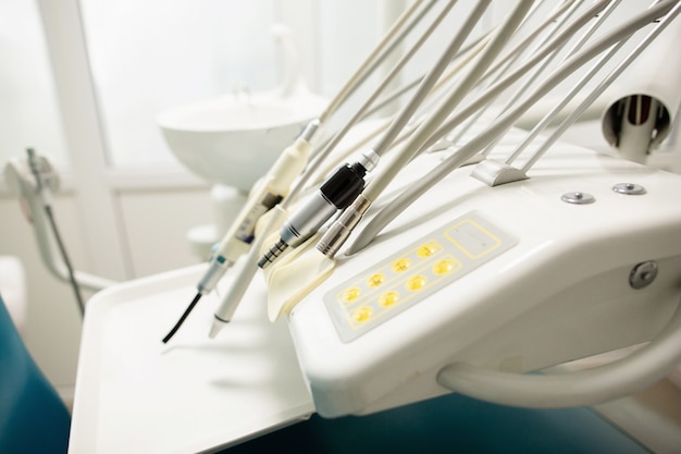 Equipment and dental instruments in dentist's office. Tools close-up. Dentistry