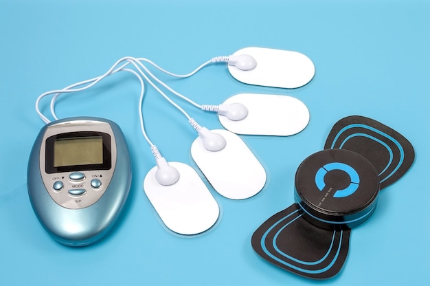 Equipment for electromassage on a blue surface