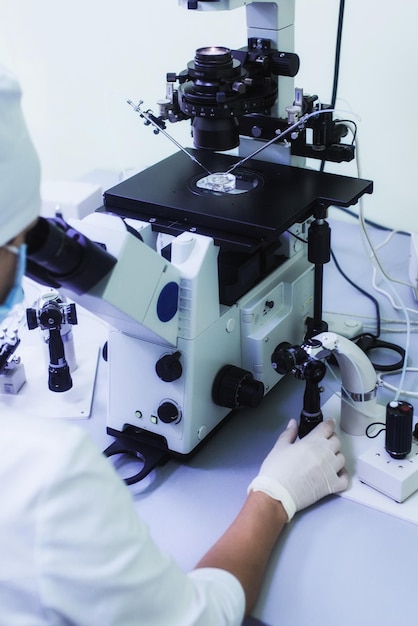 Equipment on laboratory of fertilization ivf microscope of\
reproductive medicine clinic fertilizing egg outside female body\
disease laboratory research