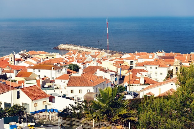 Ericeira city and green sea