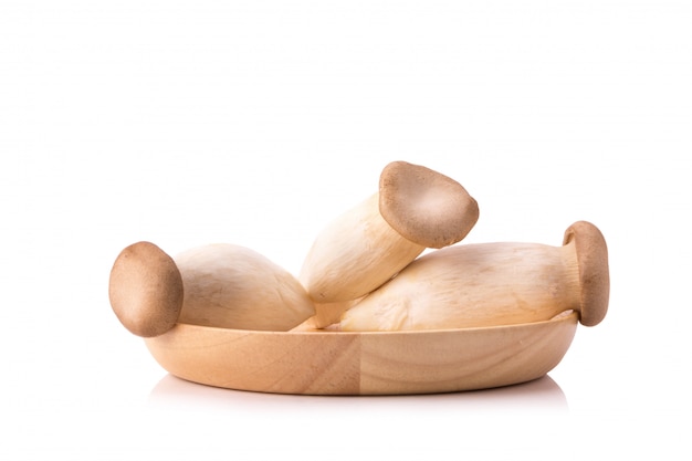  Eringi mushrooms on wooden bolw