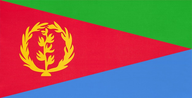 Eritrea national fabric flag, textile background. Symbol of world African country.