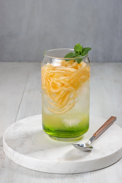 Es Blewah Indonesian cold fruity drink of cantaloupe strips with syrup