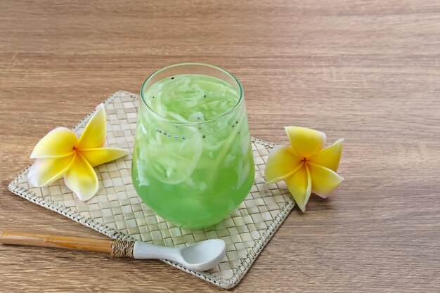 Es Kuwut traditional Balinese fruit cocktail made from young coconut melon basil seed syrup