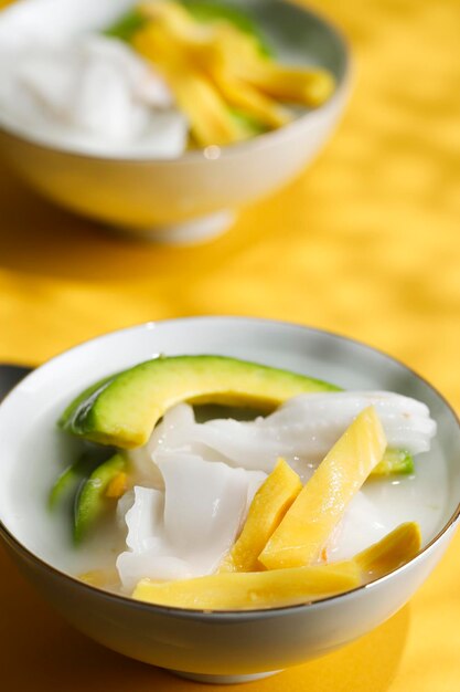 Es Teler or Es Buah, Traditional Indonesian Ice Dessert of Tropical Fruit Cocktail in Sweet Coconut Water and Condensed Milk