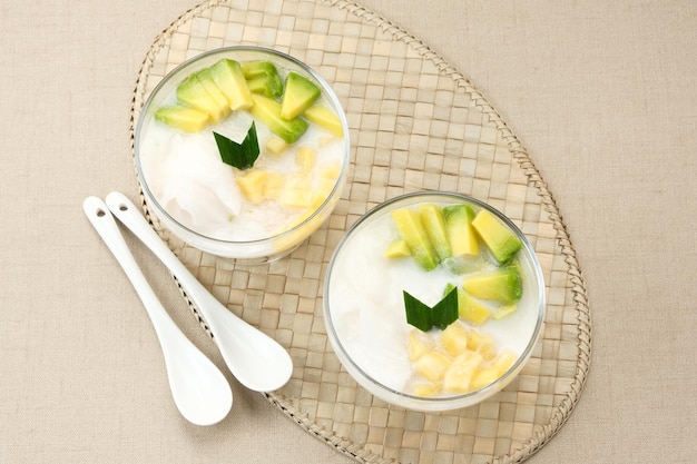 Es teler or es teller Indonesian dessert consist of avocado young coconut jackfruit served with