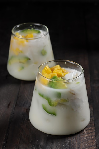 Es Teler traditional Indonesian ice dessert made from tropical fruit cocktail in coconut water