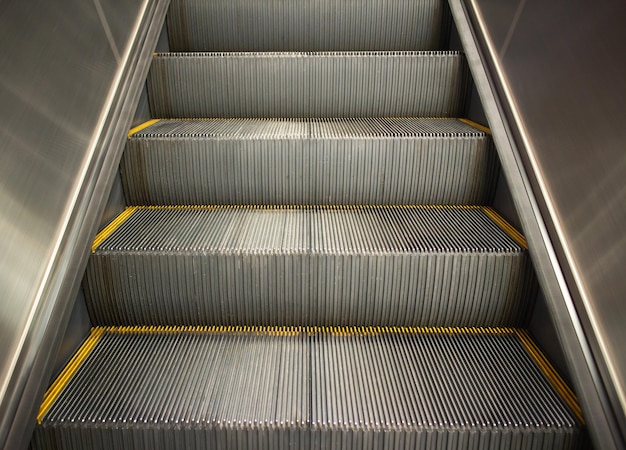 Escalator in modern office building