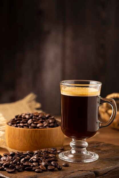 Espresso and coffee beans on the table