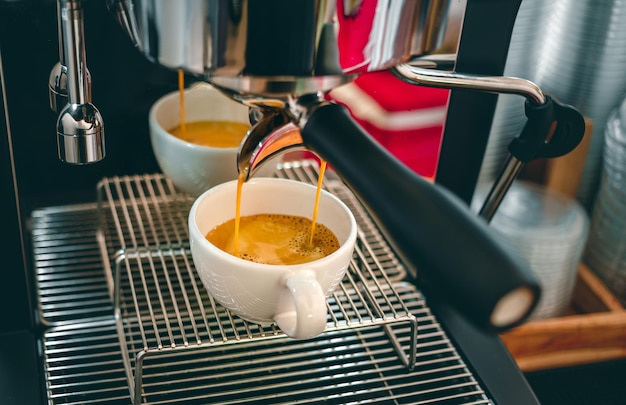 Espresso coffee extraction from a professional coffee machine with a bottomless filter