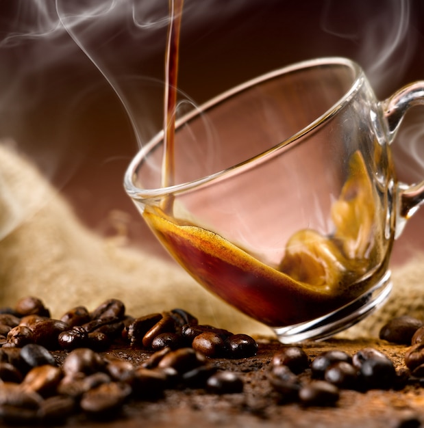 Espresso coffee poured into a glass cup