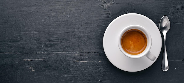 Espresso coffee On a wooden background Top view Free space for your text