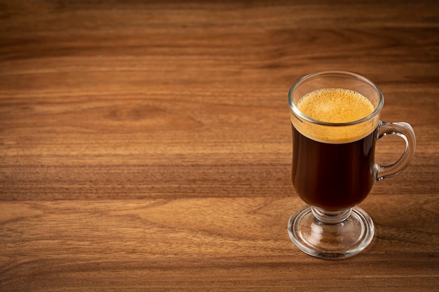 Espresso coffee on the wooden table