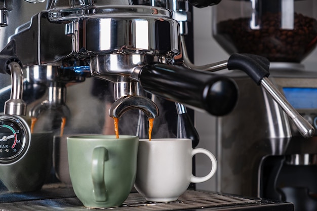 espresso machine filling two cups