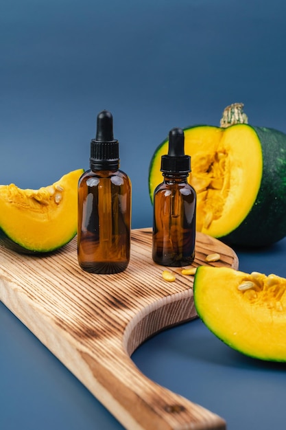 Essence for the health of facial skin on the background of pumpkin Healthy lifestyle