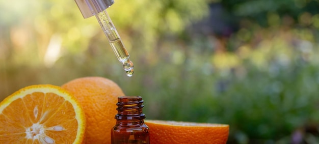 Essential extract of orange oil in a small bottle