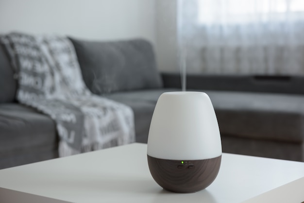 Essential oil diffuser on a white table