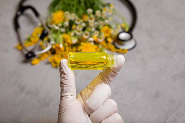 Essential oil or oil for natural diseases treatment in glass bottle