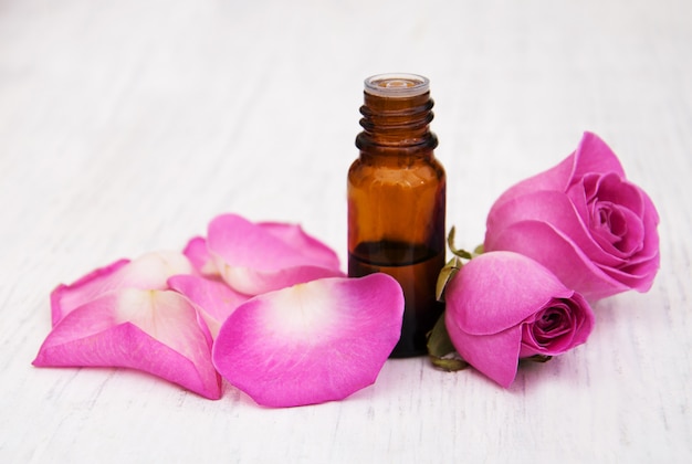 Essential oil and rose petals