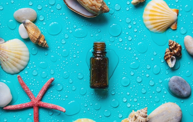 Essential oil on sea background Selective focus