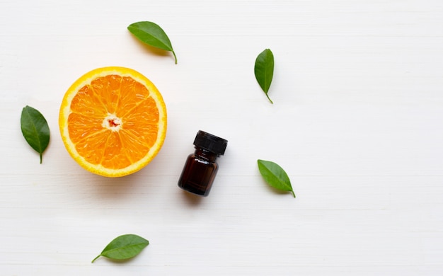 Essential oil with orange fruit