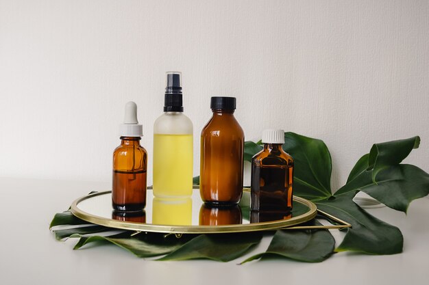 essential oils bottles on mirror