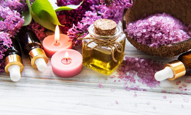 Essential oils and lilac flowers