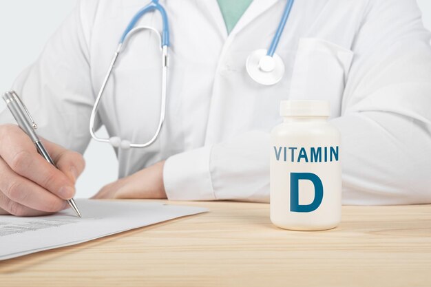 essential vitamin d and minerals for humans. doctor recommends taking vitamin d. doctor talks about benefits of vitamin d. d vitamin - health concept