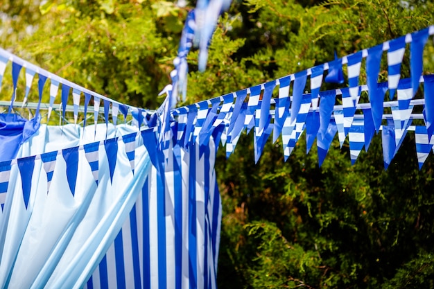 Estival flag line with blue sky in. flag hanging on blue sky for fun fiesta party event