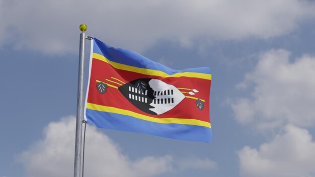 Foto eswatini vlag zwaaiend op een vlaggenpaal achtergrond hemel met wolken