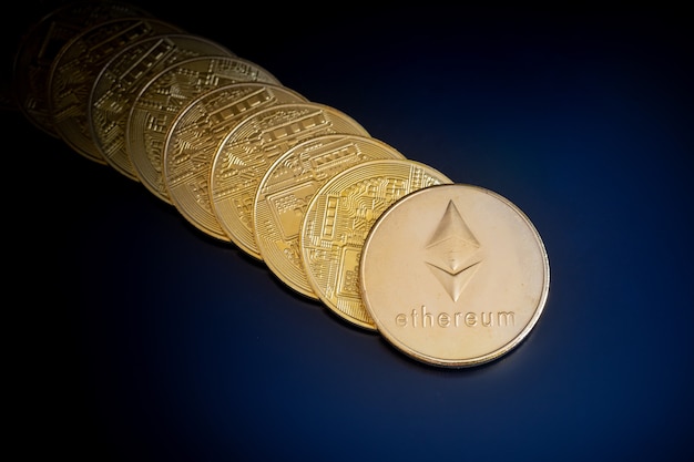 Ethereum cryptocurrency coins on black screen background