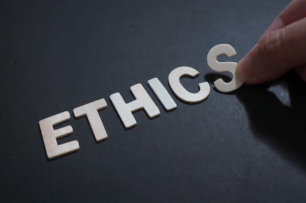 Ethics text words typography written on wooden life and business motivational inspirational concept